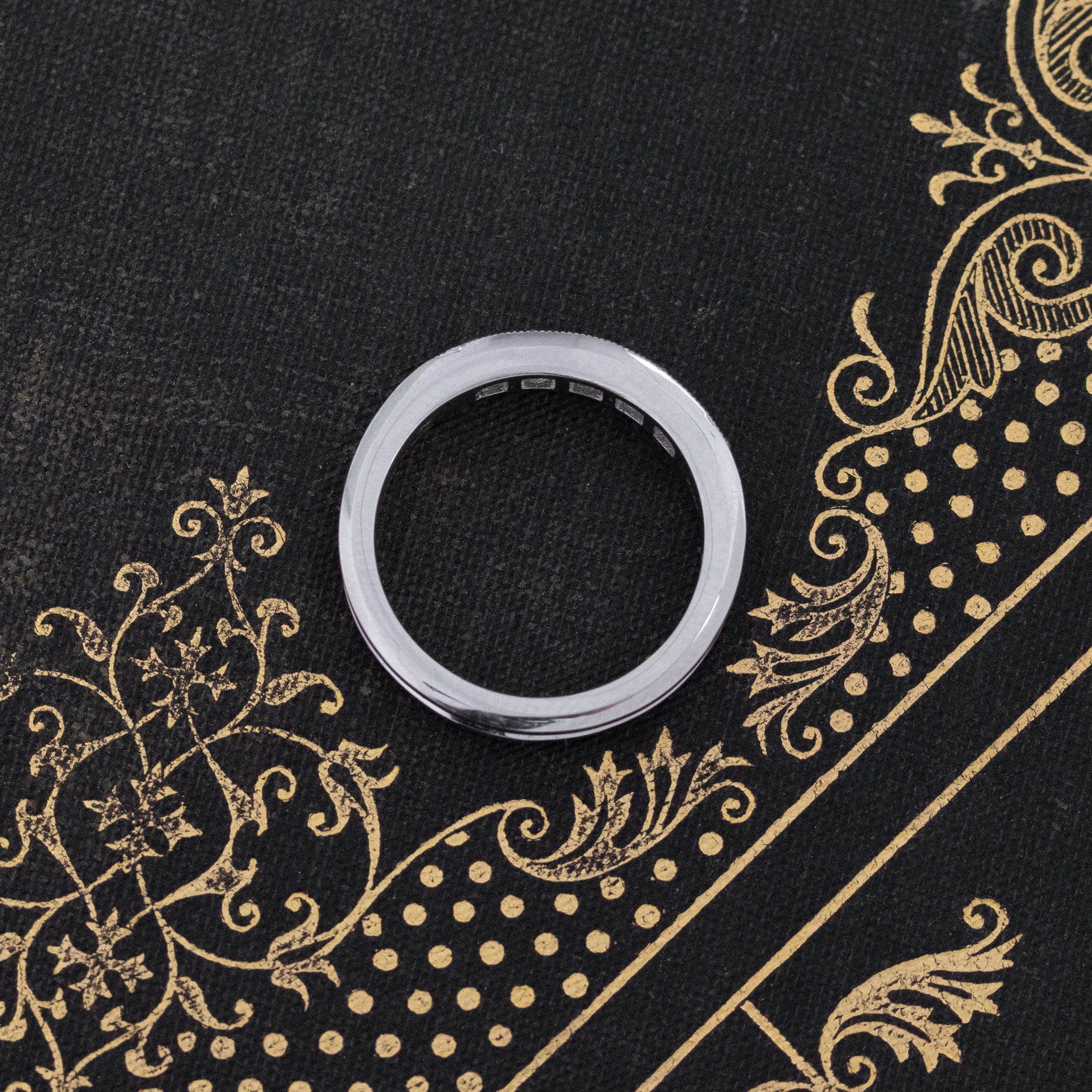 Side view of .61ctw Channel Set Old Mine Cut Diamond Band, natural Earth-mined Old Mine Cut Diamonds crafted in platinum