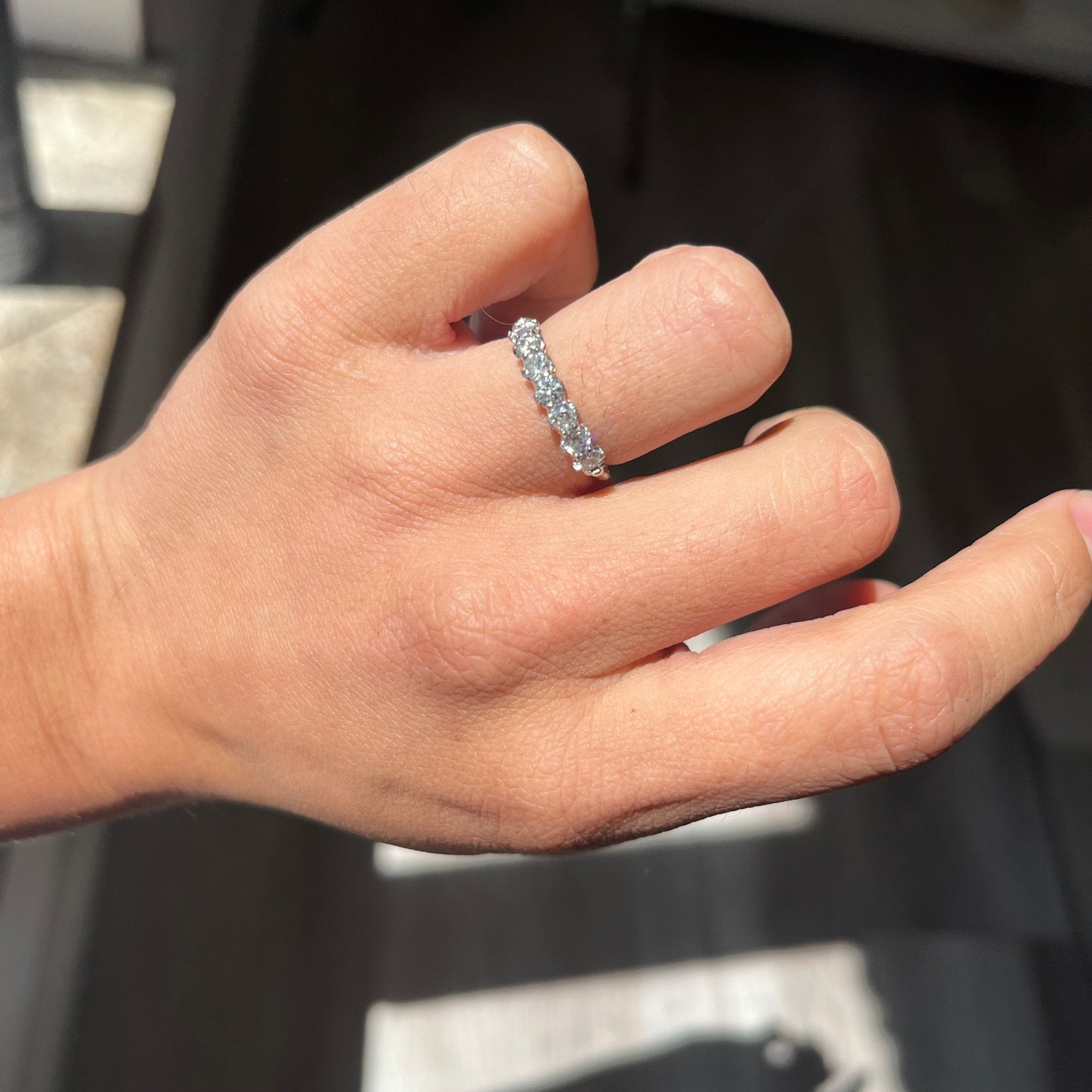 Elegant .61ctw Old European Cut Diamond Half-Hoop Band, romantic design with Old European Cut Diamonds, Earth-mined diamonds in platinum shown on ring finger