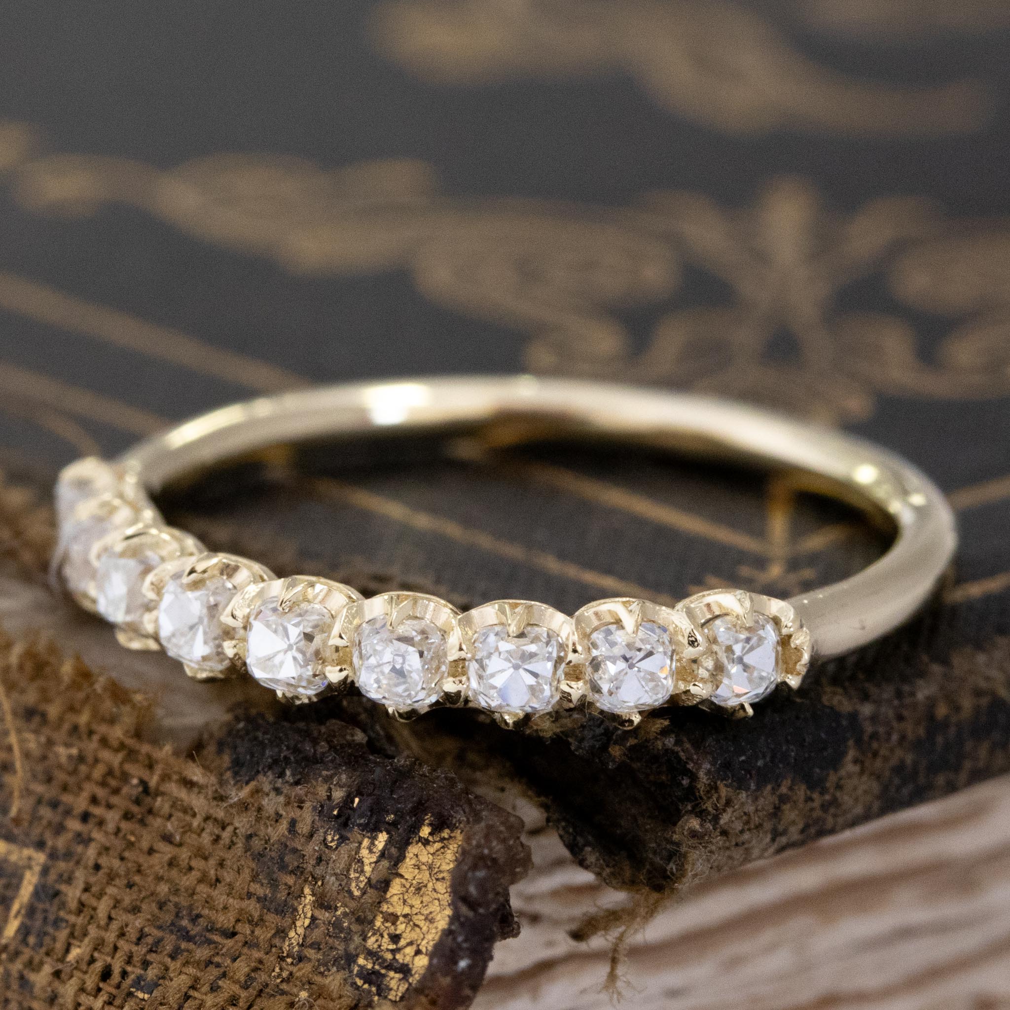 Antique lovers’ .61ctw Petite Old Mine Cut Diamond Half-Hoop Band crafted in yellow gold, featuring rare Earth-mined Old Mine Cut Diamonds