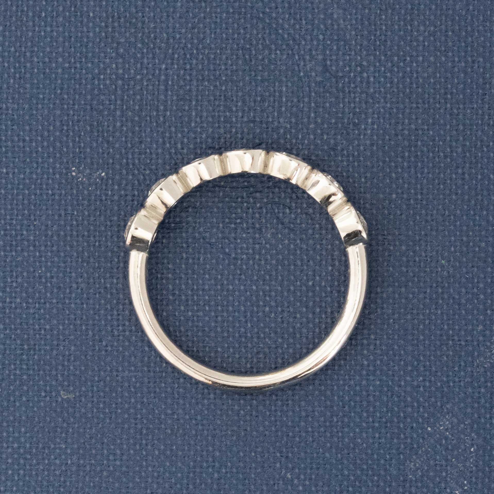 Side view of .62ctw Old European Cut Diamond 7-Stone Bezel Band, natural Earth-mined Old European Cut Diamonds in platinum