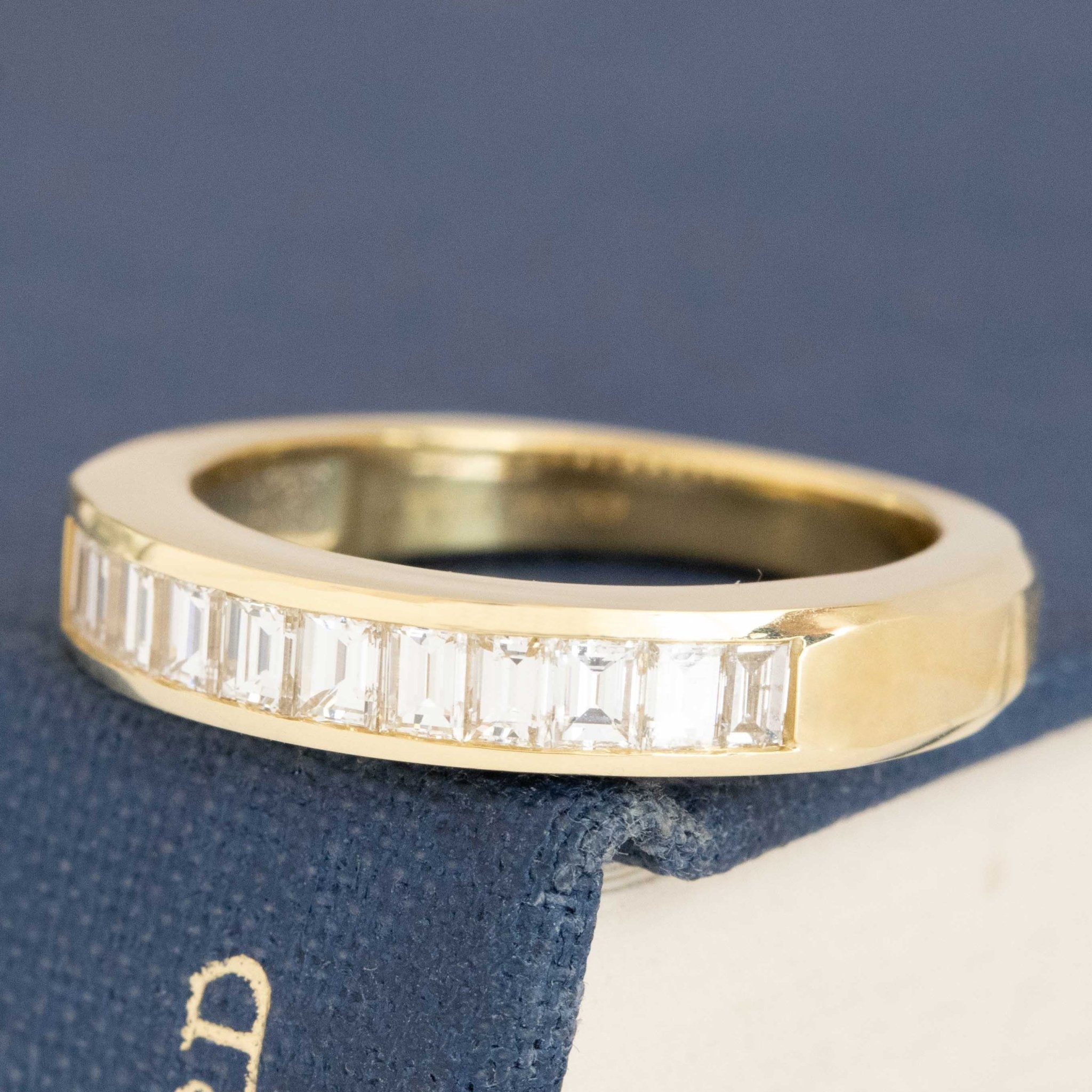 Antique lovers’ .63ctw Baguette Cut Diamond Channel Set Band in yellow gold, featuring rare Earth-mined Baguette Cut Diamonds