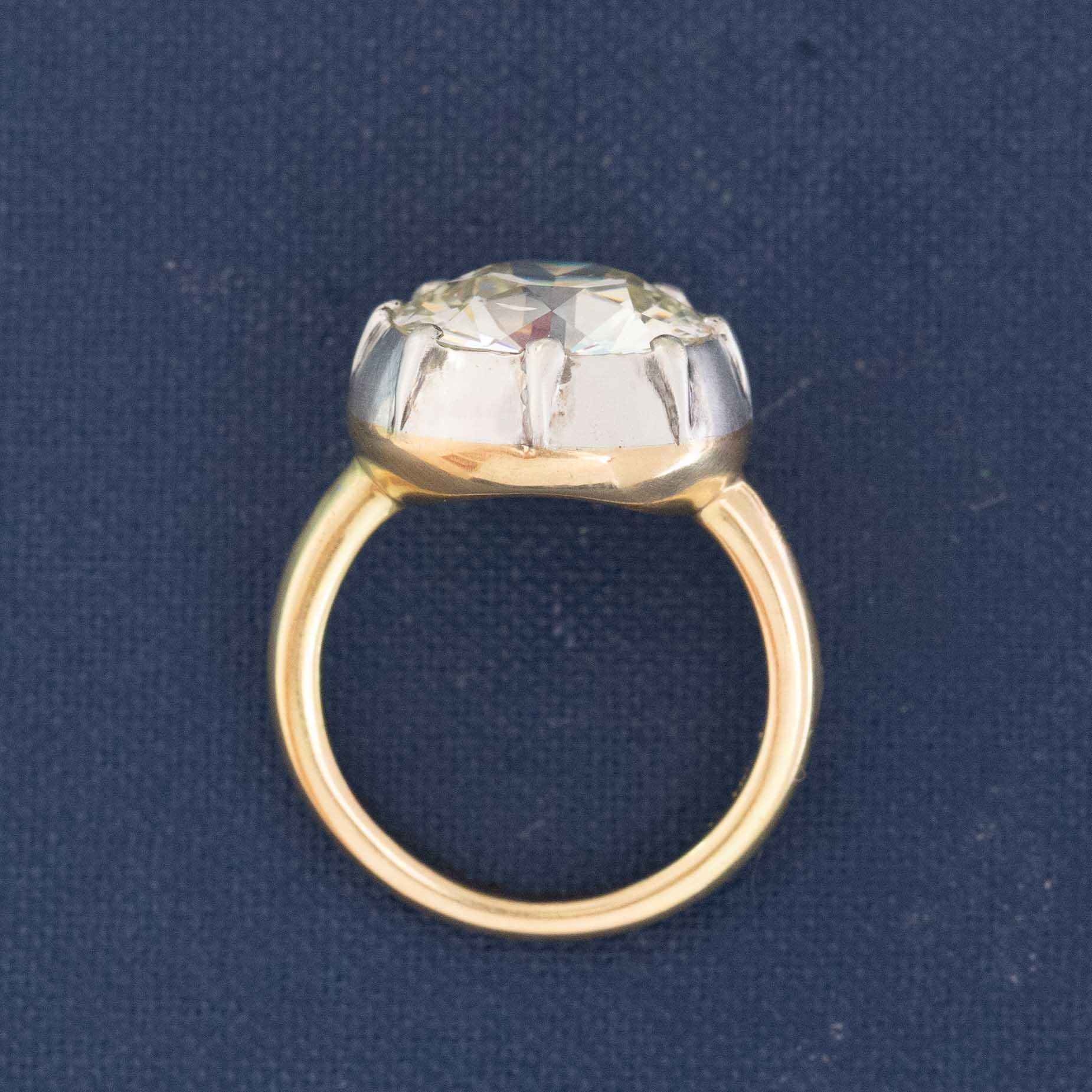 A 6.42ct old European cut diamond in a vintage inspired collet setting in silver and 18kt yellow gold. A beautiful vintage diamond and/or vintage engagement ring choice!