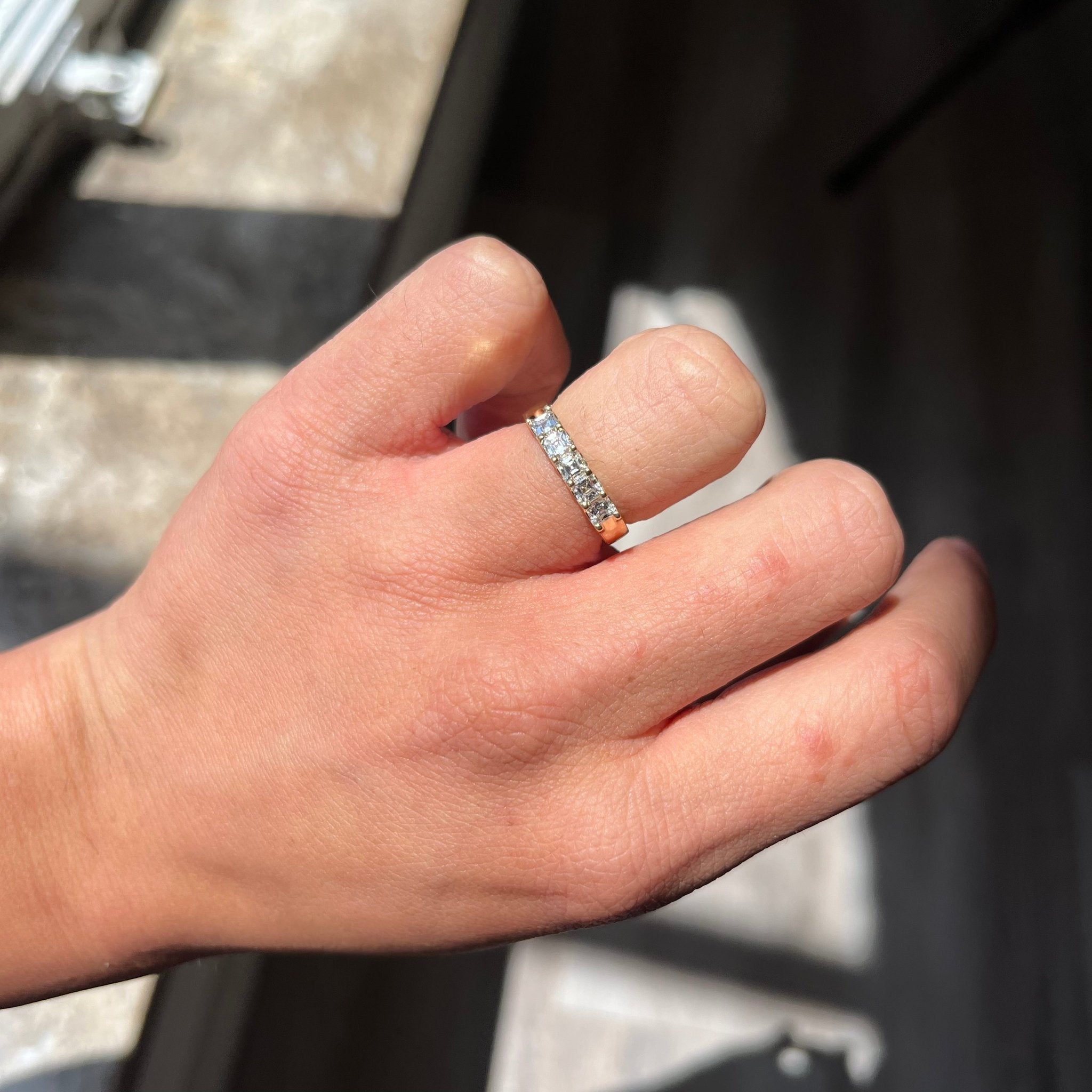 Elegant .64ctw Asscher Cut Diamond 5-Stone Band, romantic design with Antique Diamonds, Earth-mined diamonds in yellow gold shown on ring finger