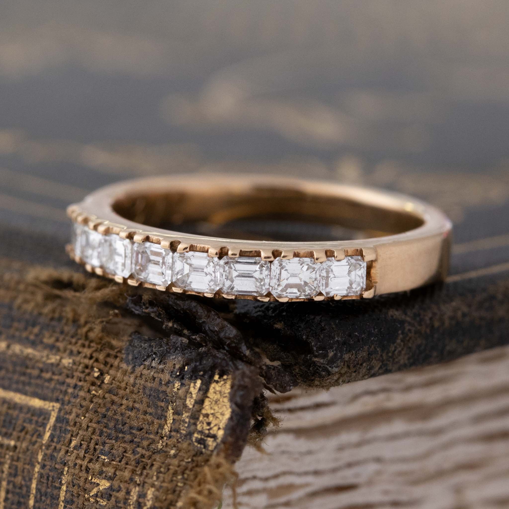 Close-up of .64ctw Emerald Cut Diamond 8-Stone Band, vintage-inspired band with Antique Diamonds, crafted in rose gold