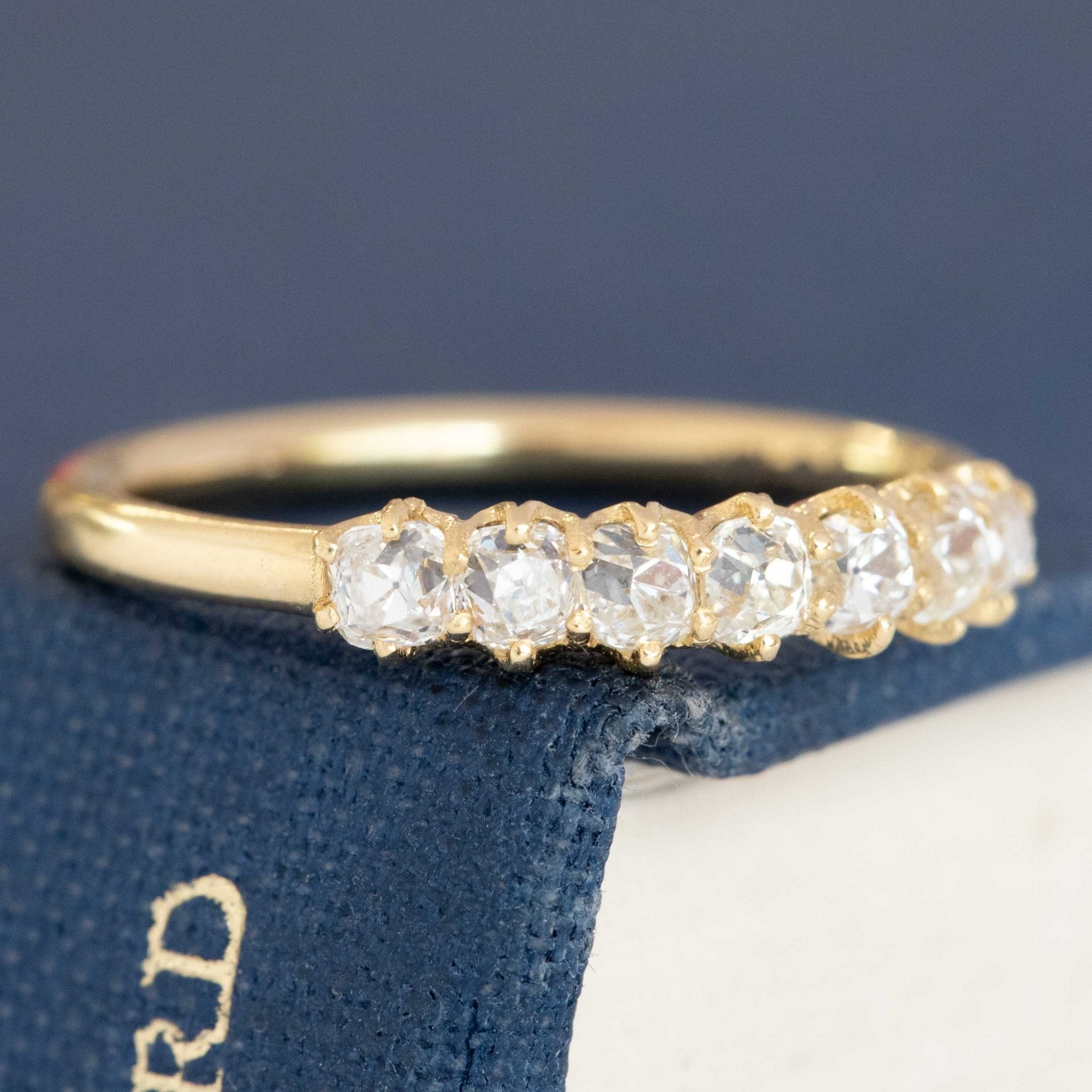 Slim Old Mine cut diamond band, seven stones, soft sparkle