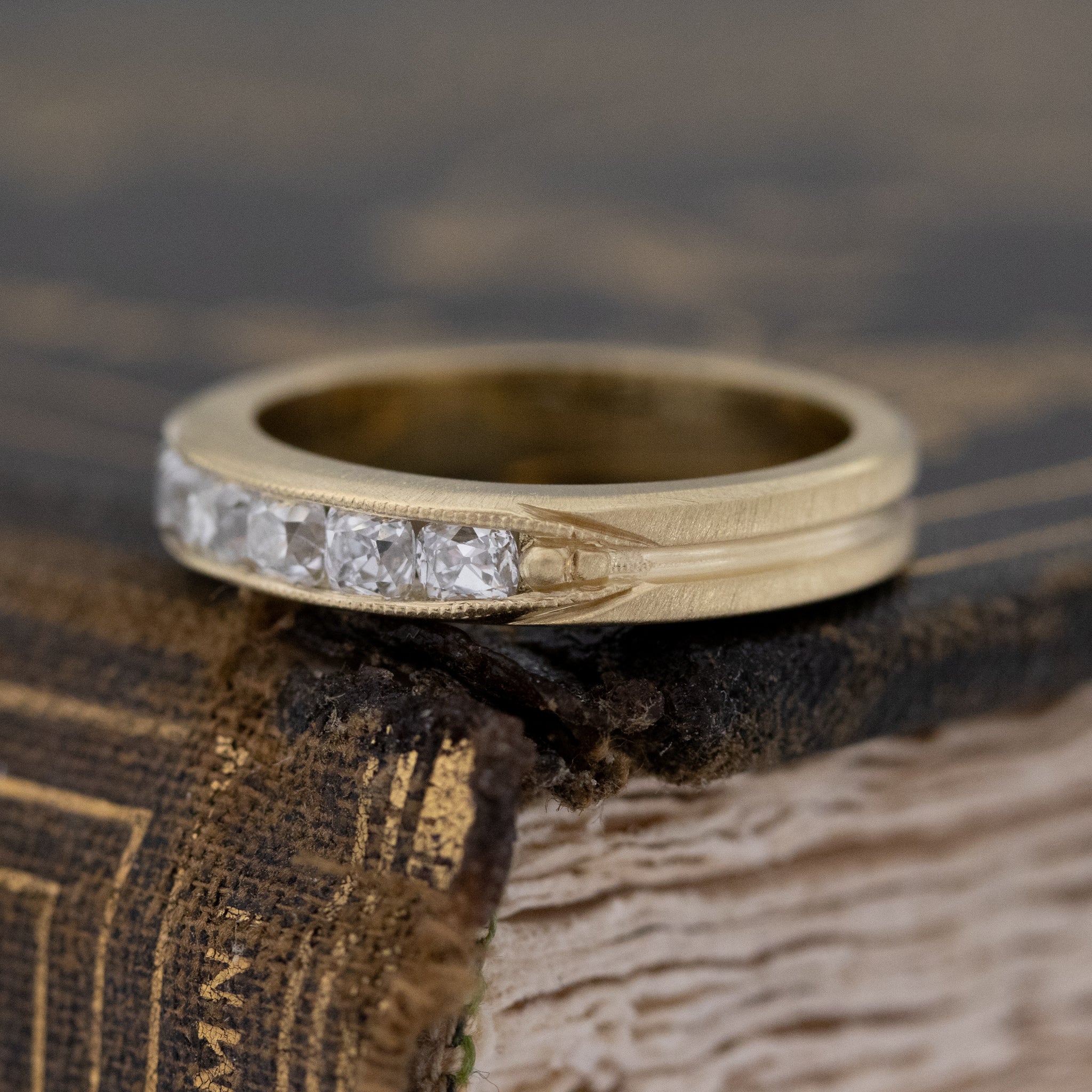 Antique lovers’ .69ctw Channel Set Old Mine Cut Diamond Band in yellow gold, featuring rare Earth-mined Old Mine Cut Diamonds