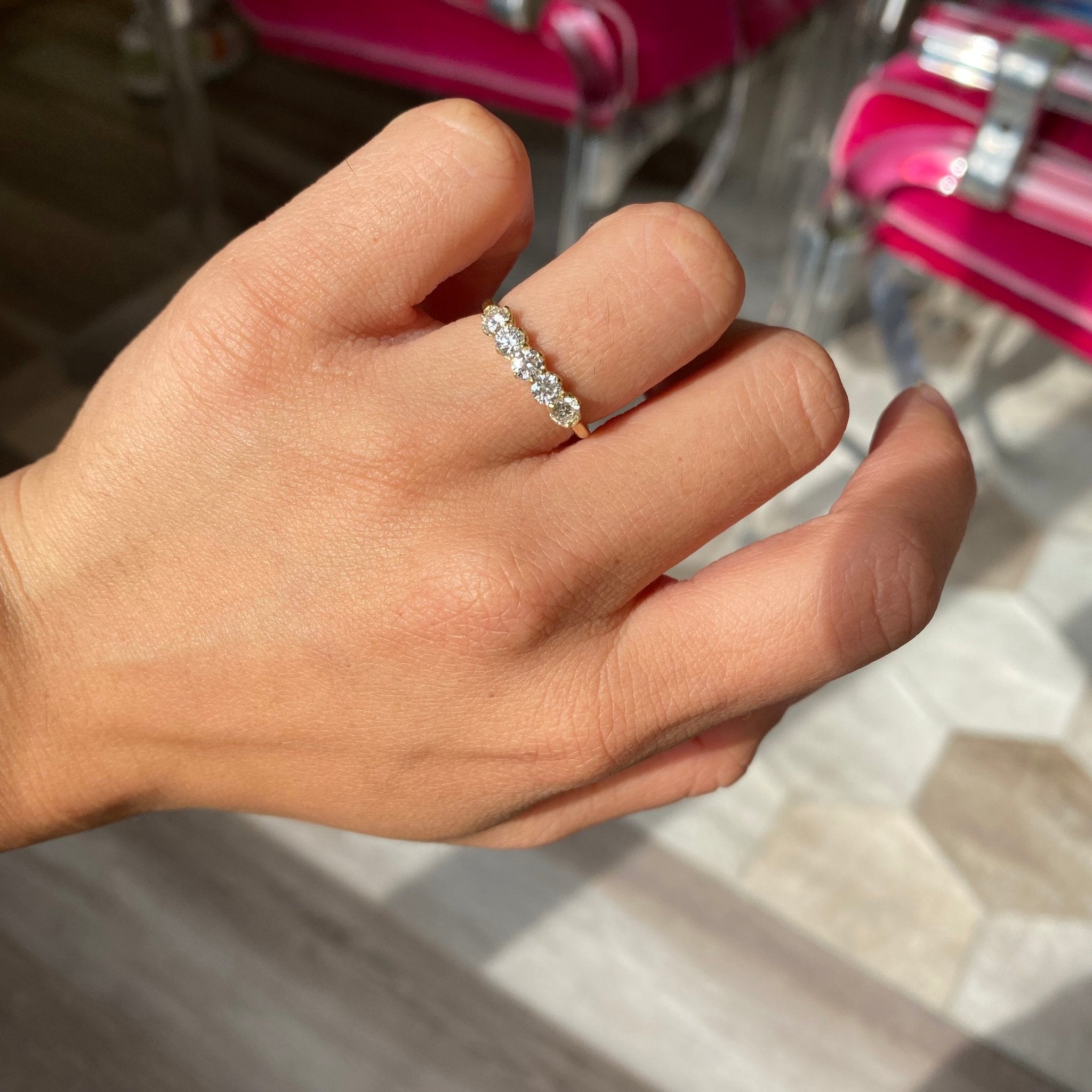 Elegant .69ctw Round Brilliant Cut Diamond 5-Stone Band, romantic design with Antique Diamonds, Earth-mined diamonds in yellow gold shown on ring finger
