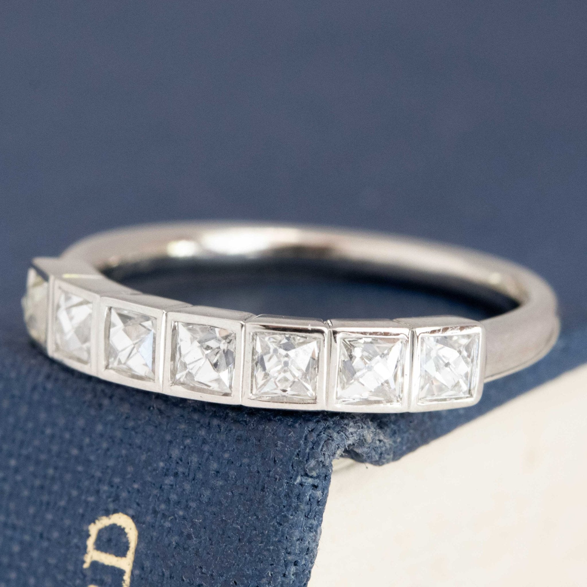 Antique lovers’ .70ctw French Cut Diamond Half-Hoop Bezel Band in platinum, featuring rare Earth-mined French Cut Diamonds