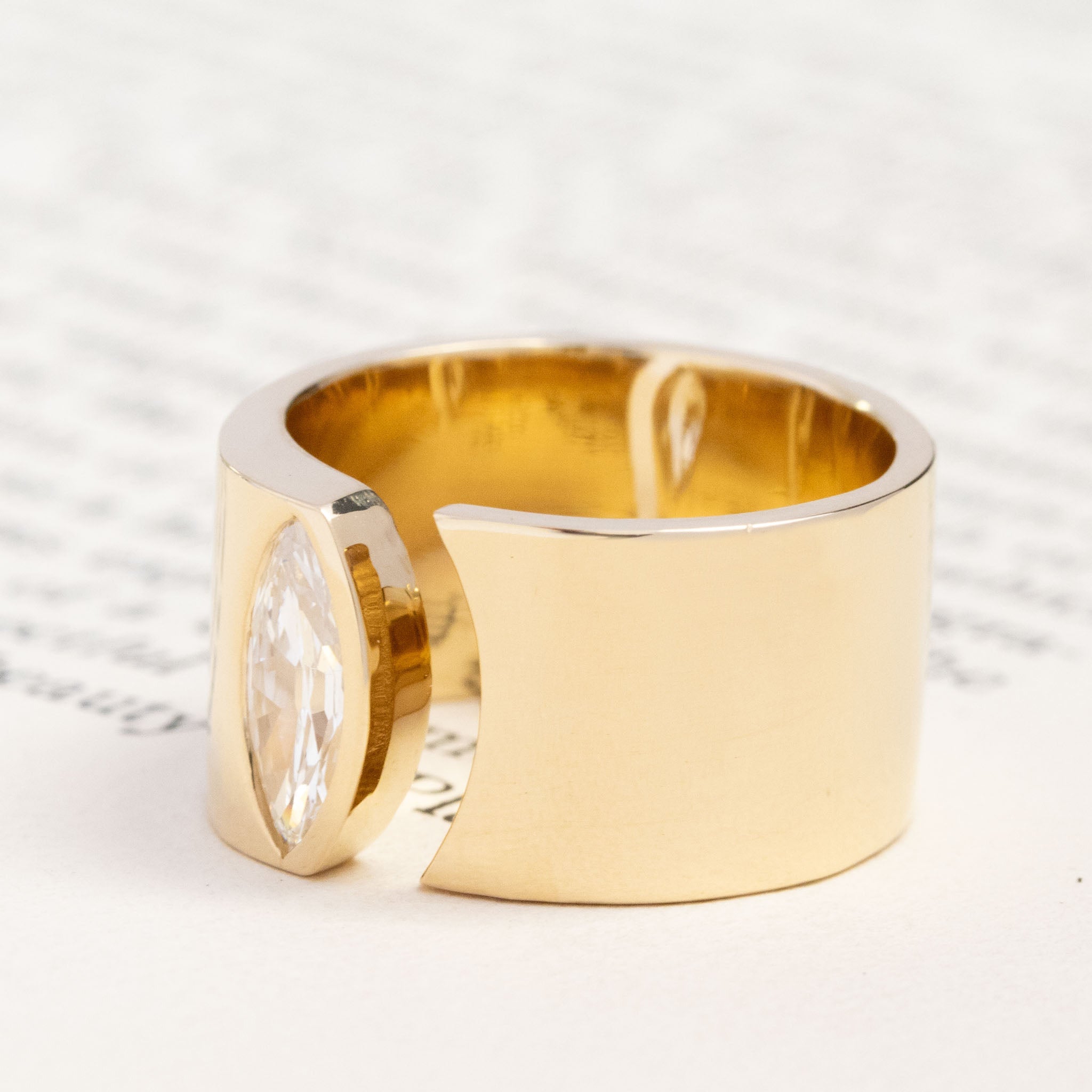 Close-up of .71ct Marquise Cut Diamond Open Cigar Band, GIA I VS2, vintage-inspired band with Antique Diamonds, crafted in yellow gold