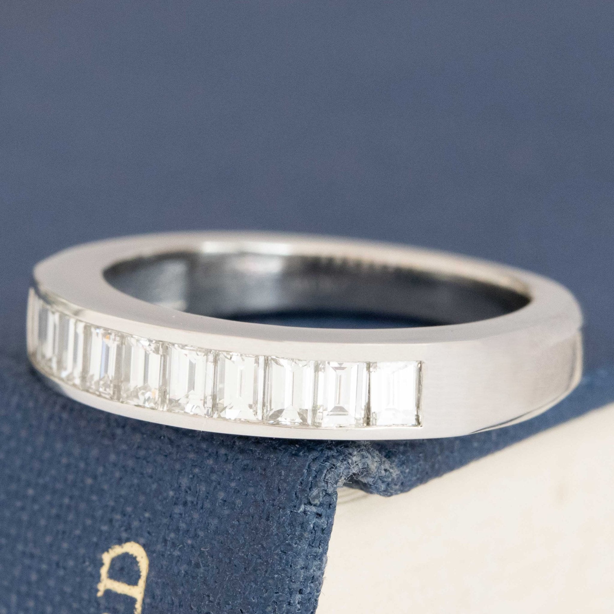 Antique lovers’ .71ctw Baguette Cut Diamond Channel Set Band in platinum, featuring rare Earth-mined Baguette Cut Diamonds