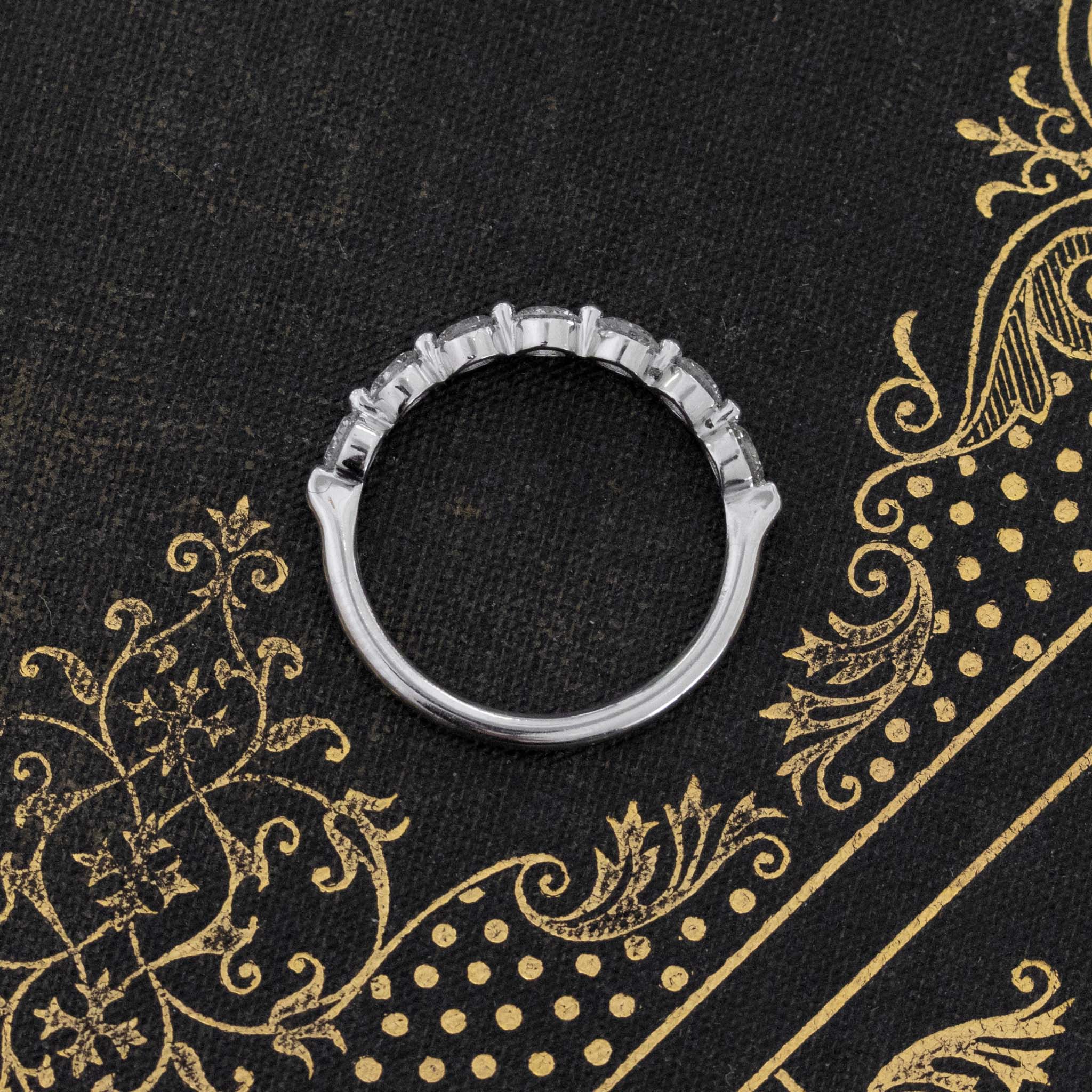 Side view of .74ctw Round Brilliant Cut Diamond Shared-Prong Band, vintage-inspired band with Antique Diamonds, crafted in platinum