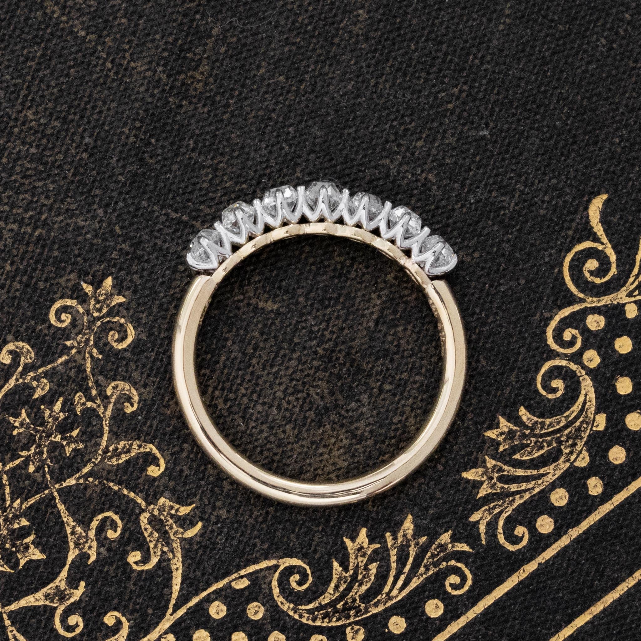 Side view of .75ctw Old Mine Cut Diamond 7-Stone Half-Hoop Band, vintage-inspired band with Old Mine Cut Diamonds, crafted with a platinum gallery and yellow gold shank