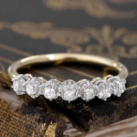 .75ctw Old Mine Cut Diamond 7-Stone Half-Hoop Band with Old Mine Cut Diamonds with a platinum gallery and yellow gold shank, antique-inspired one-of-a-kind wedding band