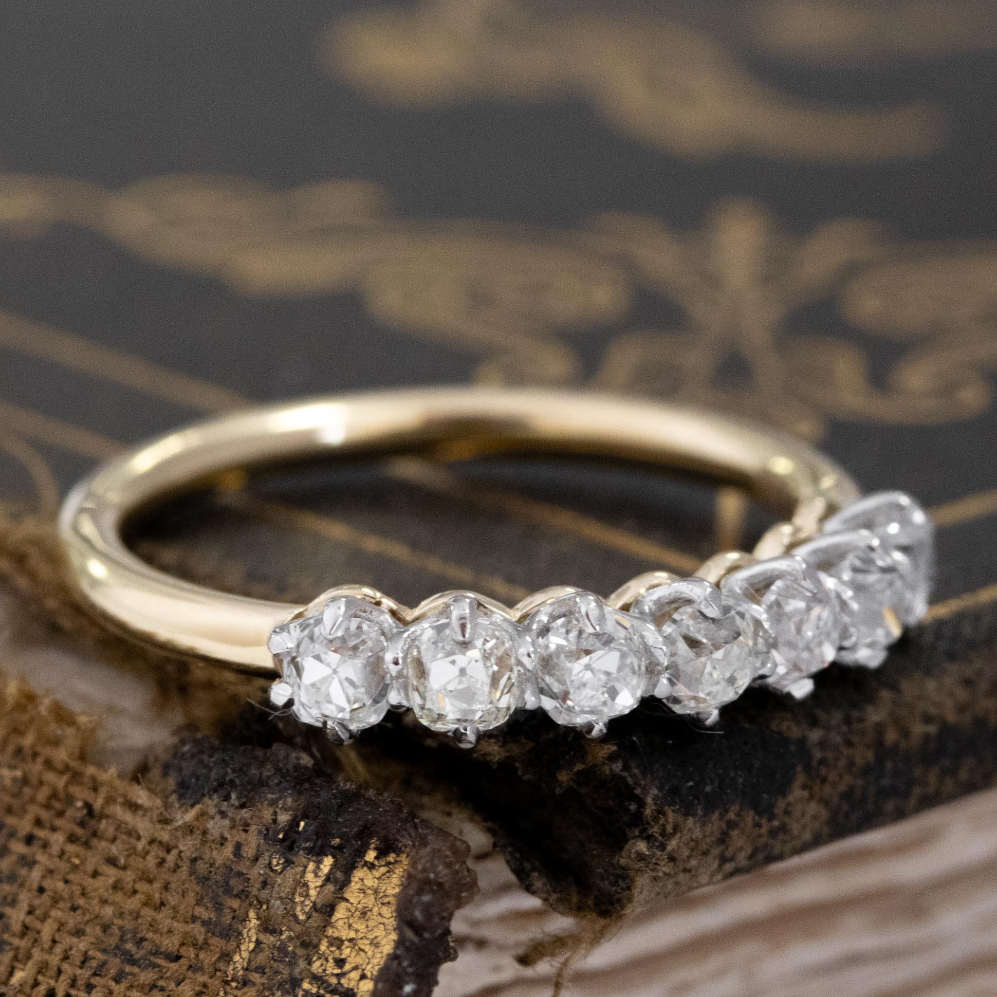Historic style .75ctw Old Mine Cut Diamond 7-Stone Half-Hoop Band wedding band with Old Mine Cut Diamonds, unique heirloom with a platinum gallery and yellow gold shank