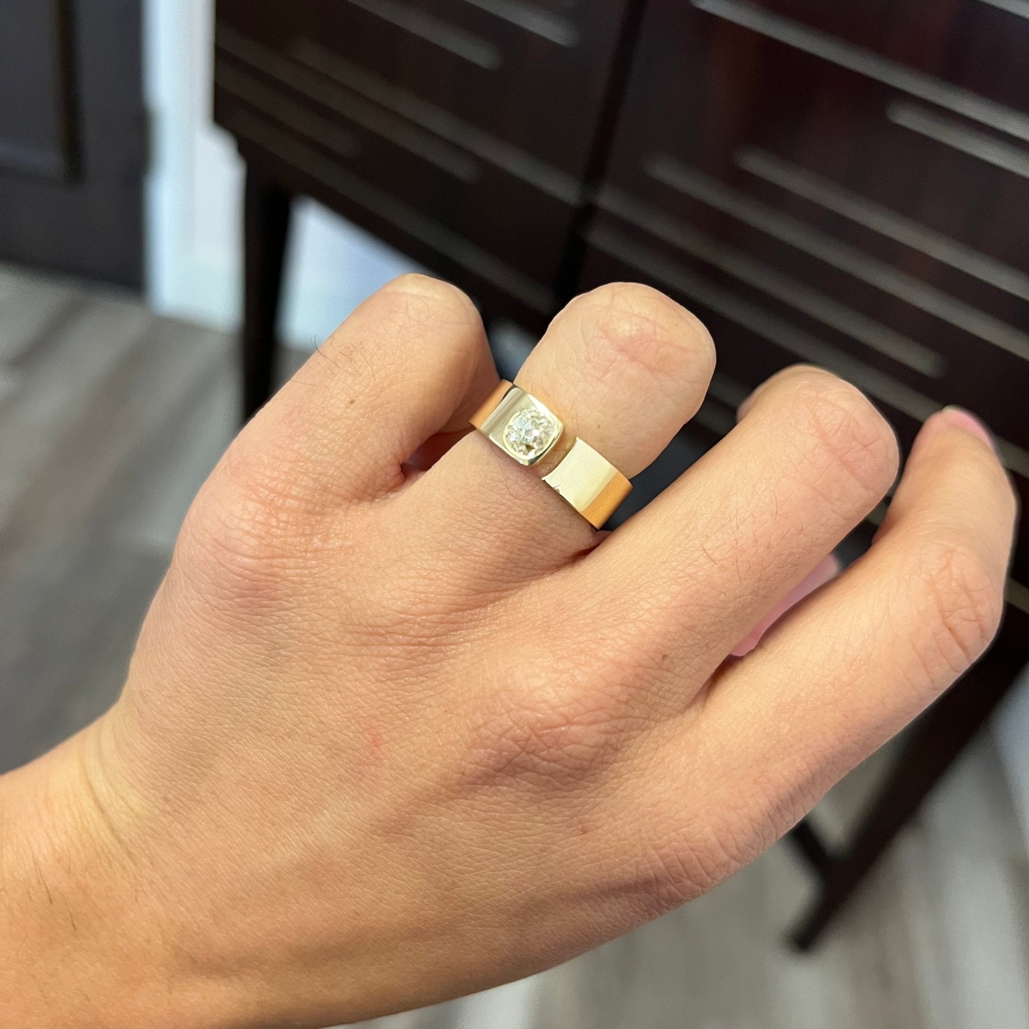 Elegant .79ct Old Mine Cut Diamond Open Cigar Band, romantic design with Old Mine Cut Diamonds, Earth-mined diamonds in yellow gold shown on ring finger