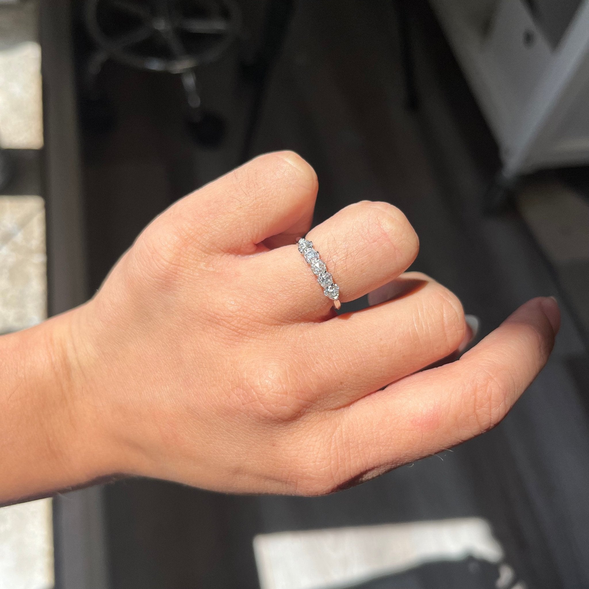 Elegant .79ctw Petite Old Mine Cut Diamond 5-Stone Band, romantic design with Old Mine Cut Diamonds, Earth-mined diamonds in platinum shown on ring finger