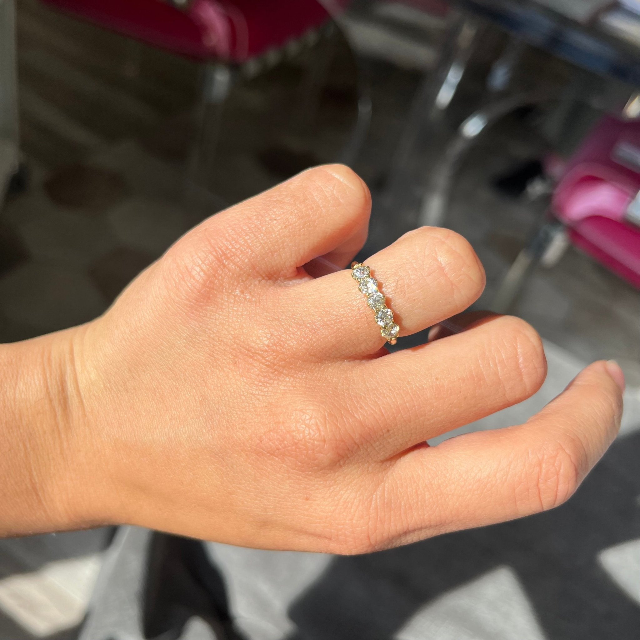Elegant .80ctw Old European Cut Diamond 5-Stone Half-hoop Band, romantic design with Old European Cut Diamonds, Earth-mined diamonds in yellow gold shown on ring finger