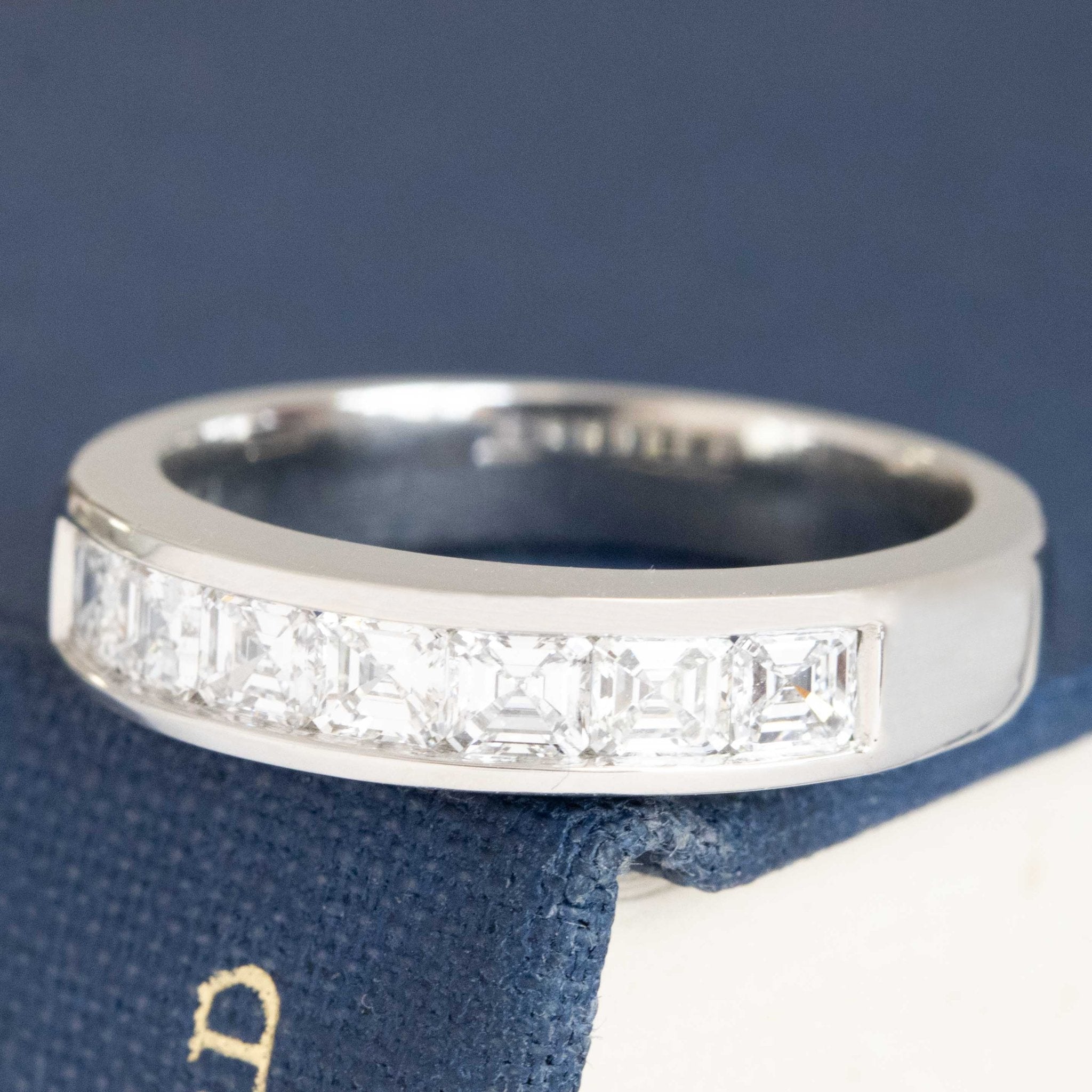 Antique lovers’ .85ctw Asscher Cut Diamond Channel Set Band in platinum, featuring rare Earth-mined Antique Diamonds