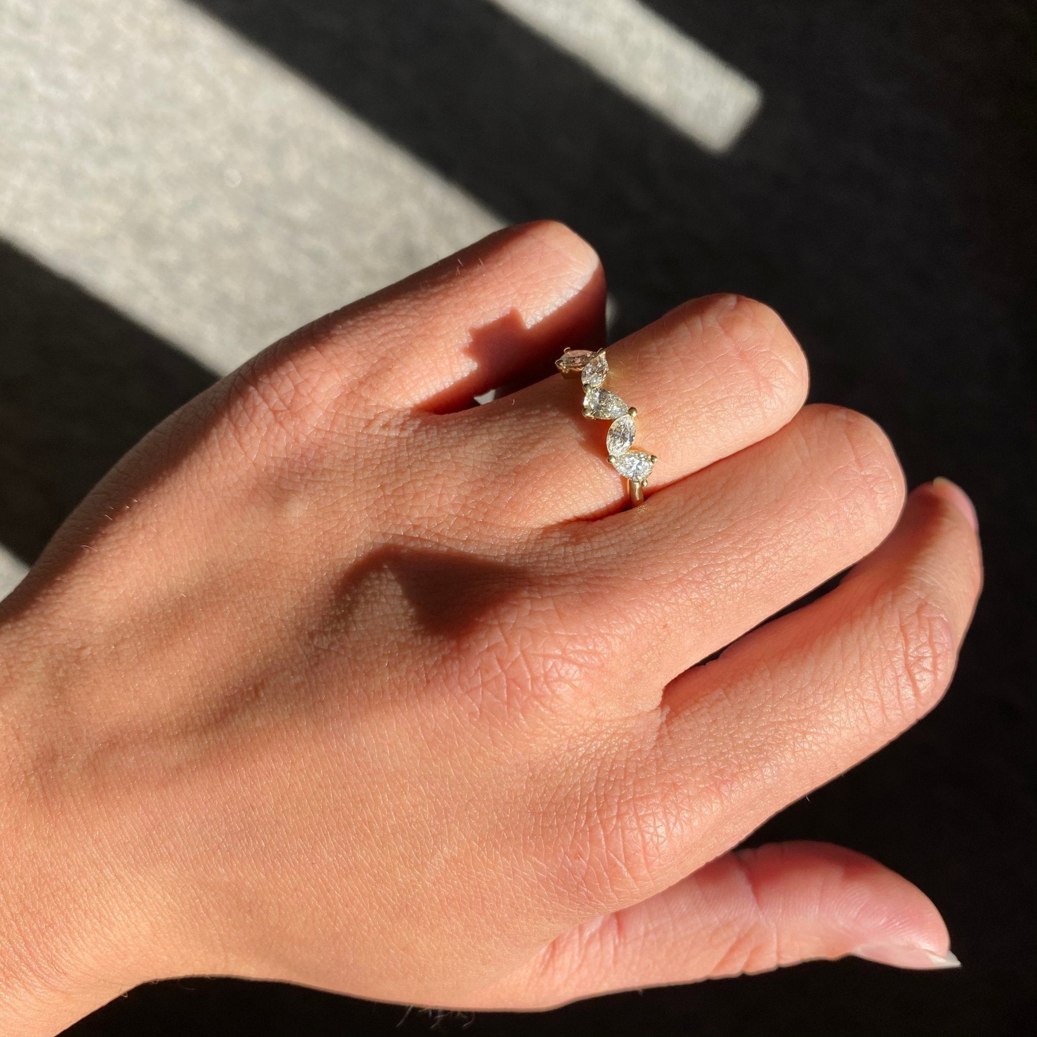 Elegant .87ctw Mixed Pear & Marquise Cut Diamond 5-Stone Band, romantic design with Antique Diamonds, Earth-mined diamonds in yellow gold shown on ring finger