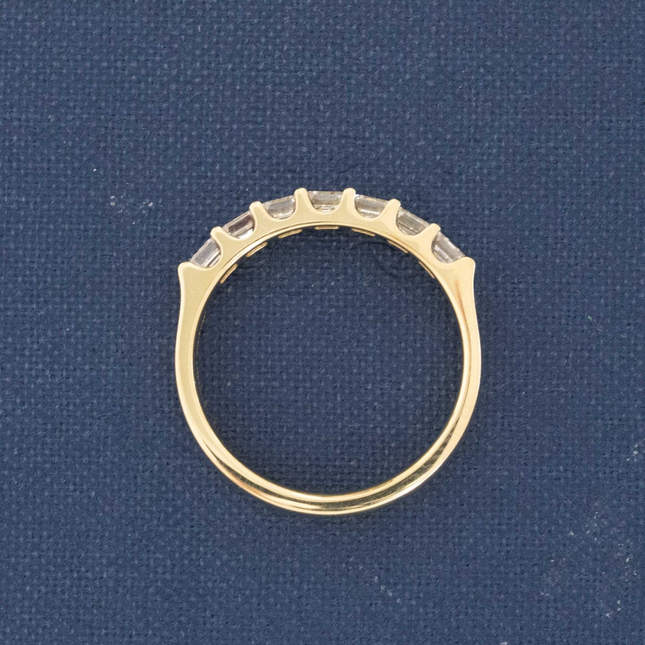 Side view of .88ctw Asscher Cut Diamond 7-Stone Band, vintage-inspired band with Antique Diamonds, crafted in yellow gold