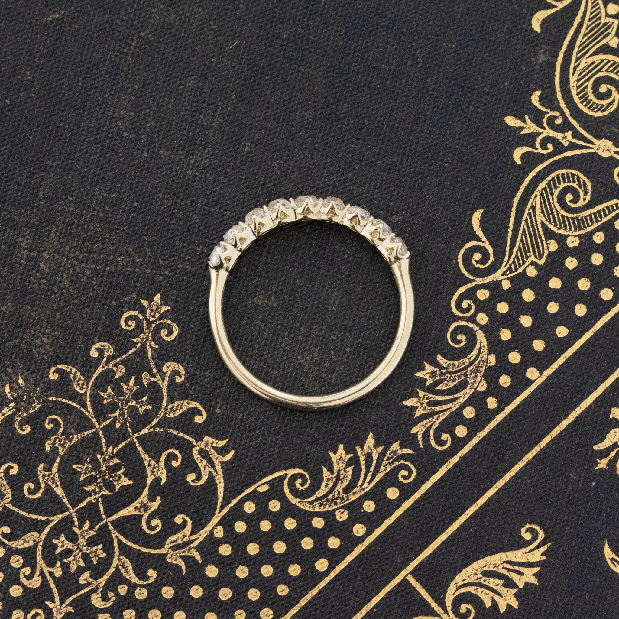 Side view of .89ctw Petite Old Mine Cut Diamond Half-Hoop Band, vintage-inspired band with Old Mine Cut Diamonds, crafted in yellow gold