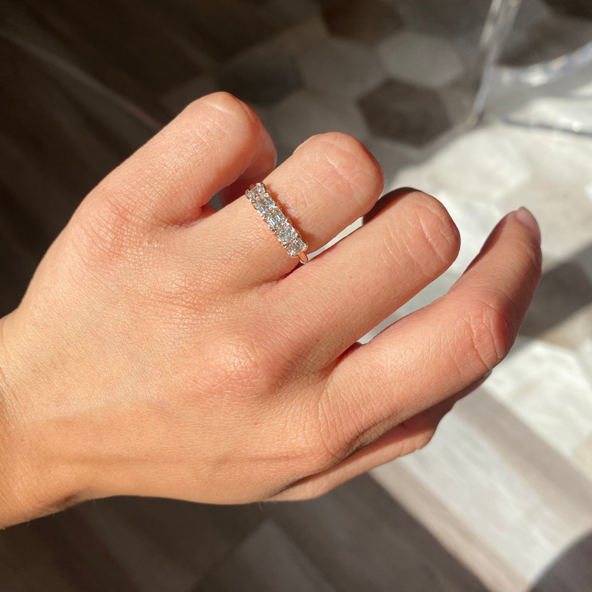 Elegant .90ctw Asscher Cut Diamond 5-Stone Band, romantic design with Antique Diamonds, Earth-mined diamonds in rose gold shown on ring finger