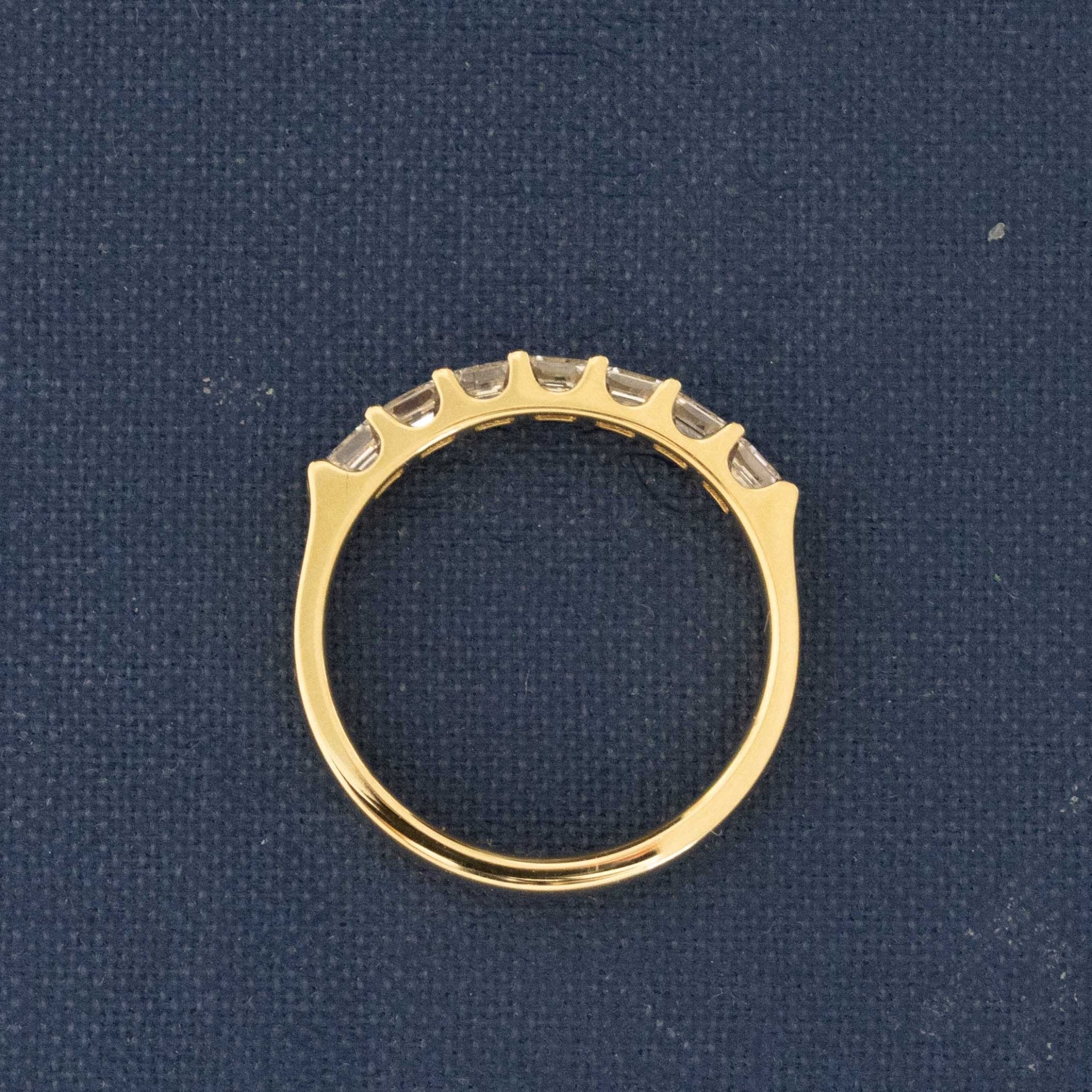 Side view of .90ctw Asscher Cut Diamond 7-Stone Band, vintage-inspired band with Antique Diamonds, crafted in yellow gold