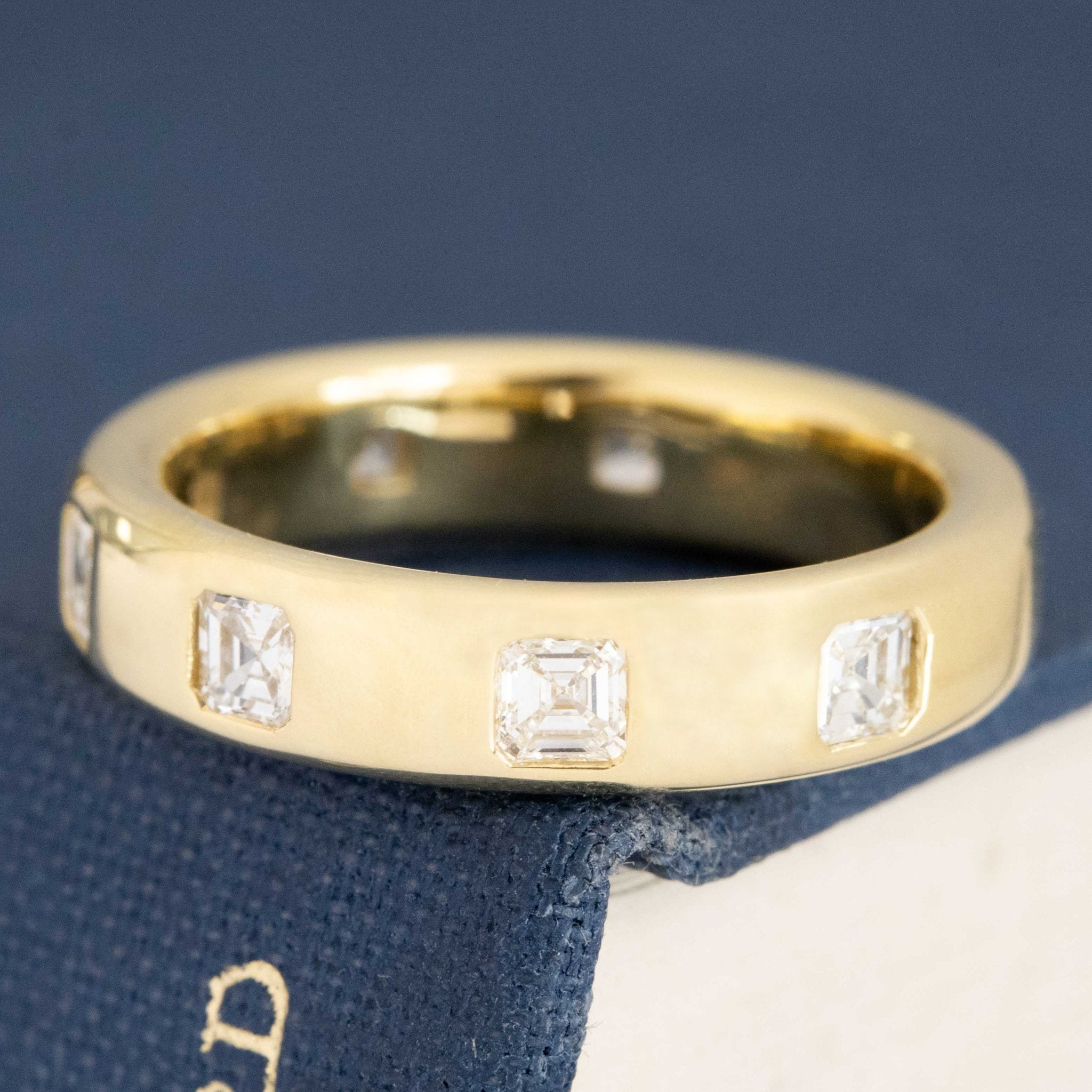 Antique lovers’ .90ctw Asscher Cut Diamond Scatter Eternity Band in yellow gold, featuring rare Earth-mined Antique Diamonds