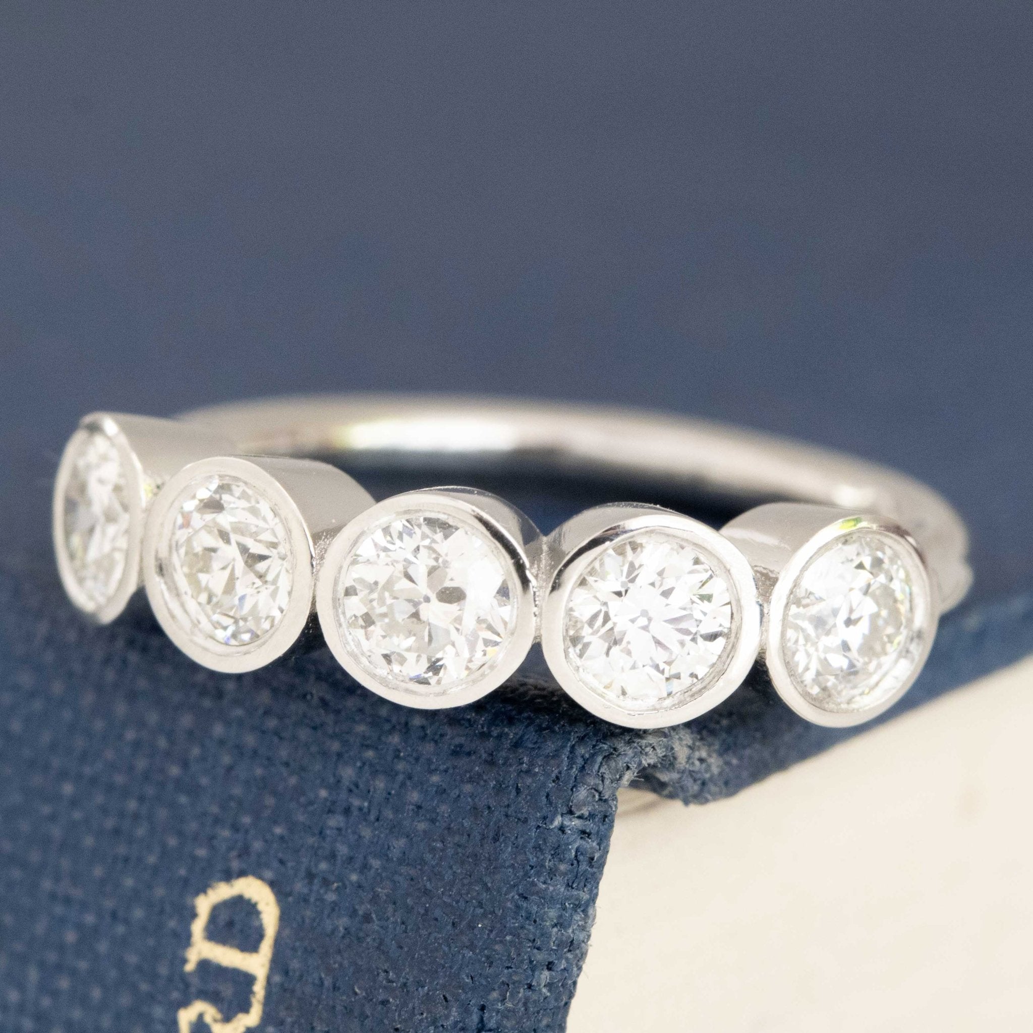 Antique lovers’ .93ctw Old European Cut Diamond 5-Stone Bezel Band in platinum, featuring rare Earth-mined Old European Cut Diamonds