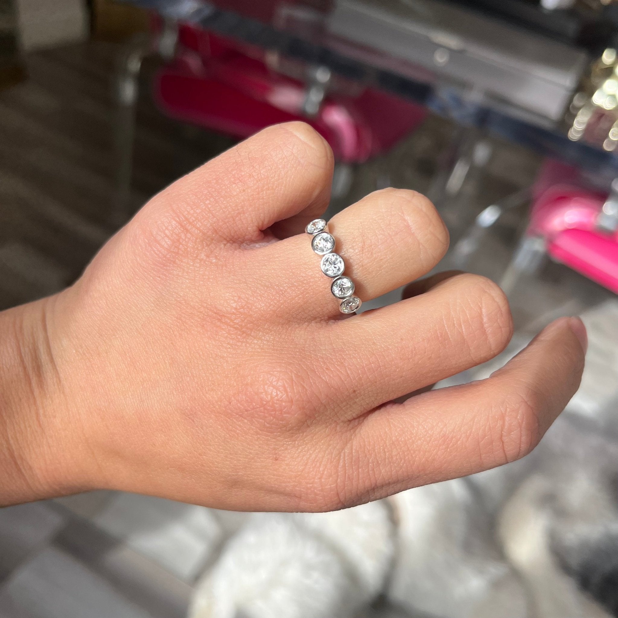 Elegant .93ctw Old European Cut Diamond 5-Stone Bezel Band, romantic design with Old European Cut Diamonds, Earth-mined diamonds in platinum shown on ring finger