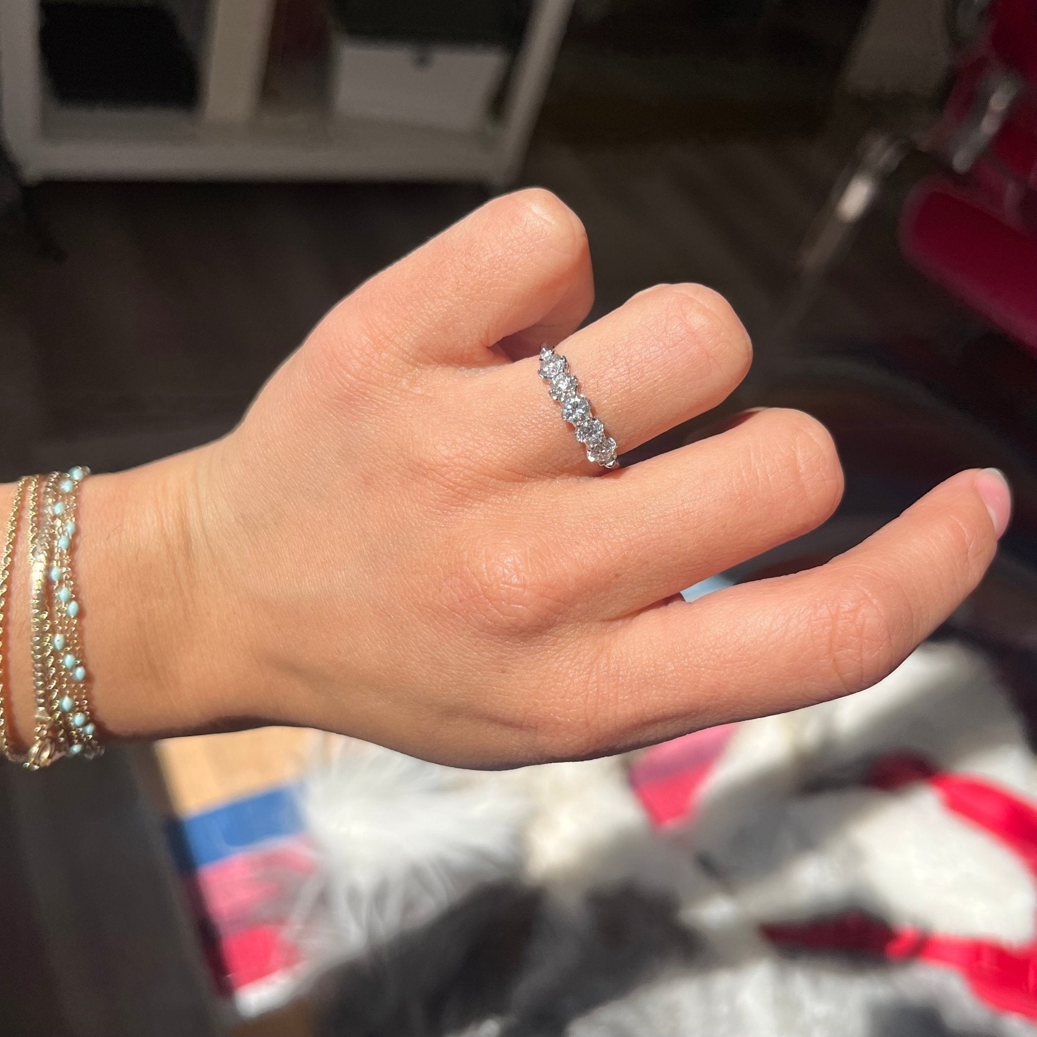Elegant .94ctw Petite Old European Cut Diamond 5-Stone Band, romantic design with Old European Cut Diamonds, Earth-mined diamonds in platinum shown on ring finger