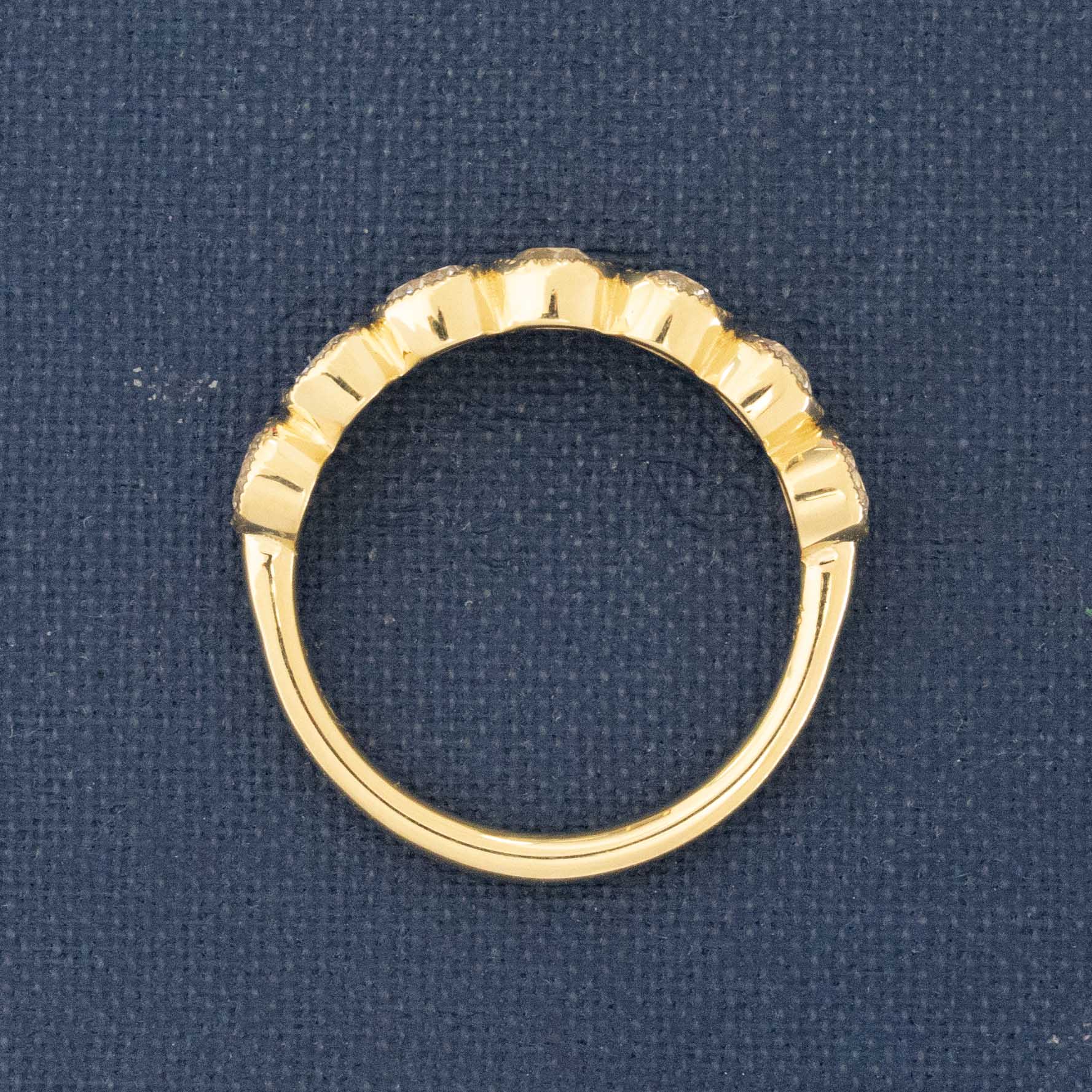 Side view of .94ctw Petite Old European Cut Diamond Half-Hoop Bezel Band, natural Earth-mined Old European Cut Diamonds in yellow gold