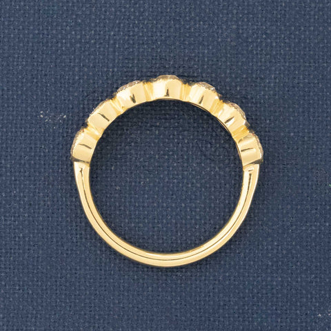 Side view of .94ctw Petite Old European Cut Diamond Half-Hoop Bezel Band, natural Earth-mined Old European Cut Diamonds in yellow gold