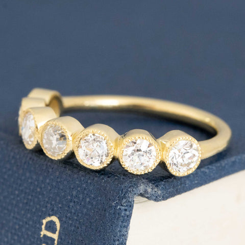 Antique lovers’ .94ctw Petite Old European Cut Diamond Half-Hoop Bezel Band in yellow gold, featuring rare Earth-mined Old European Cut Diamonds