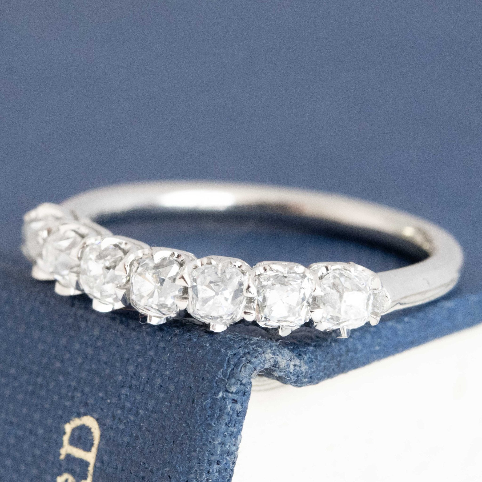 Antique lovers’ .95ctw Old Mine Cut Diamond 7-Stone Half-Hoop Band in platinum, featuring rare Earth-mined Old Mine Cut Diamonds