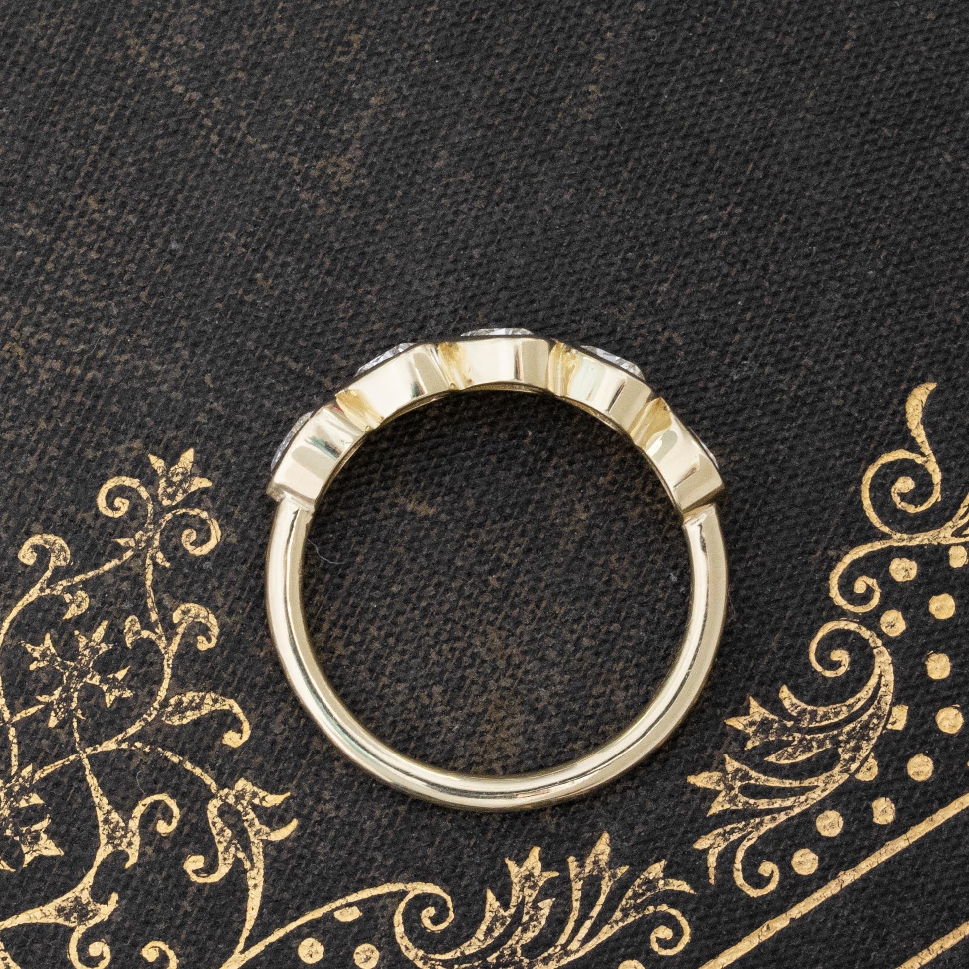 Side view of .96ctw Heart Cut Diamond Bezel 5-Stone Band, vintage-inspired band with Antique Diamonds, crafted in yellow gold