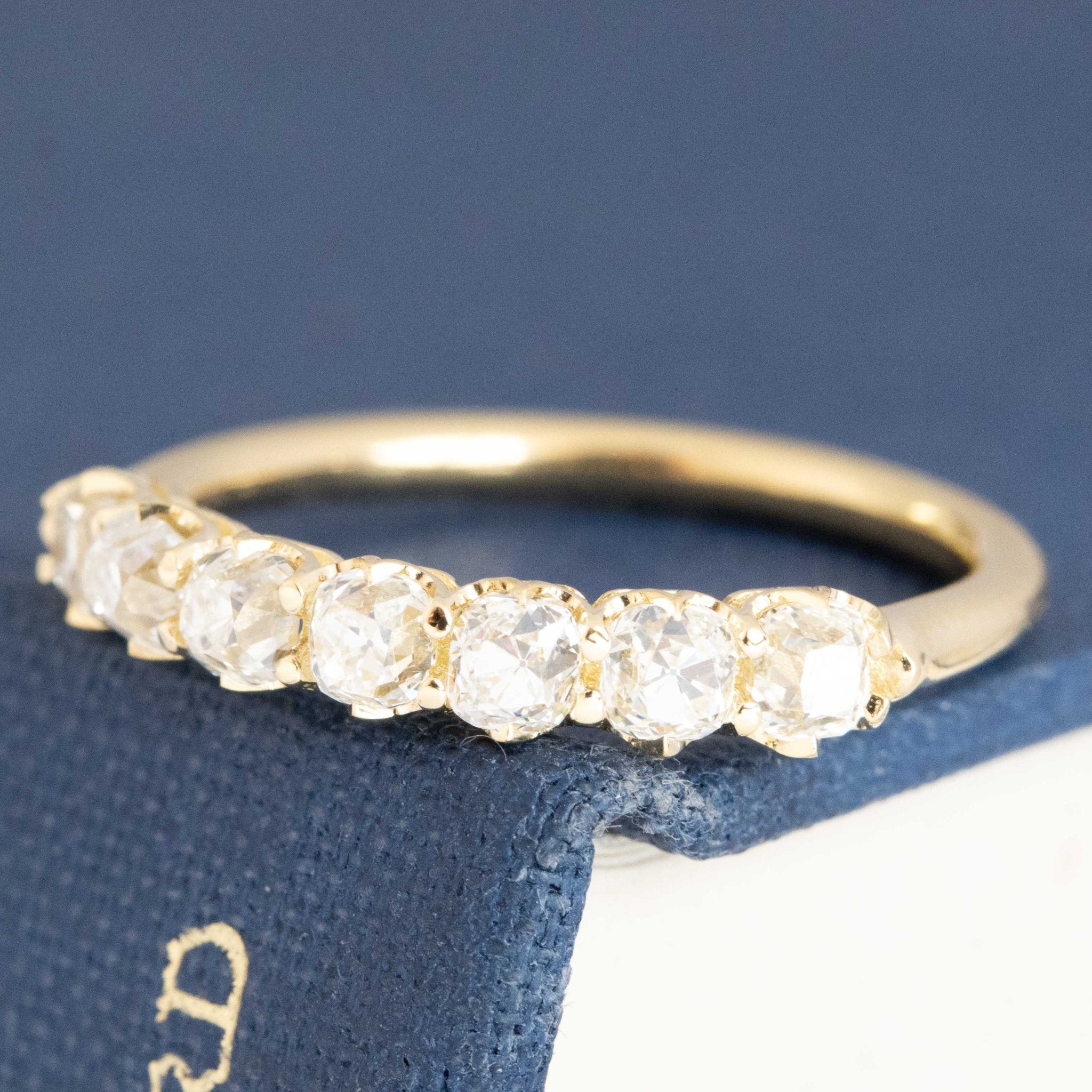 Antique lovers’ .99ctw Old Mine Cut Diamond 7-Stone Half-Hoop Band in yellow gold, featuring rare Earth-mined Old Mine Cut Diamonds