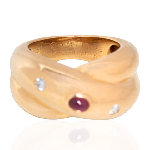 Sculptural Cartier Colisée ring with ruby and diamond accents