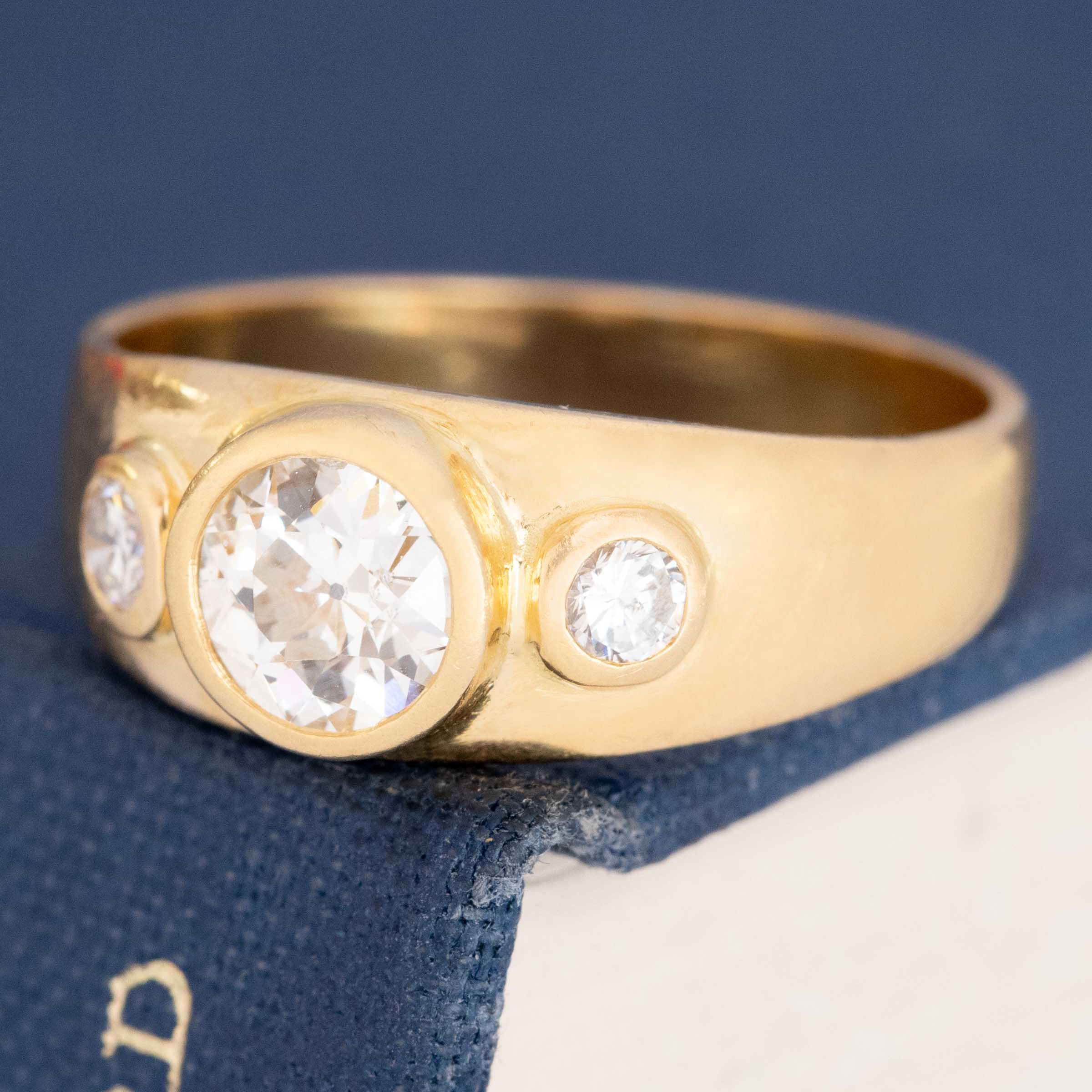 side view of antique style diamond three-stone ring