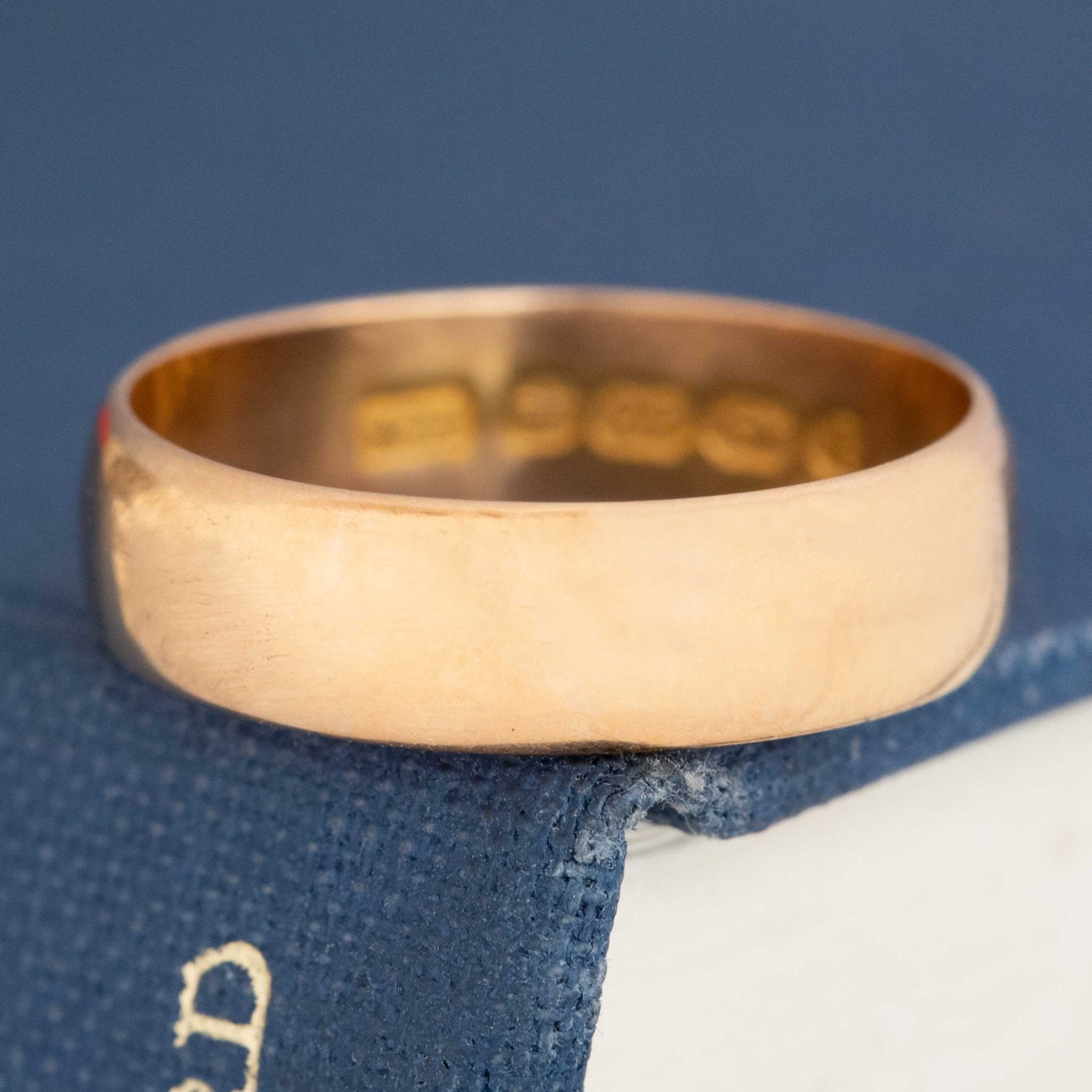 Antique 22kt gold wedding band with rich patina and timeless design.