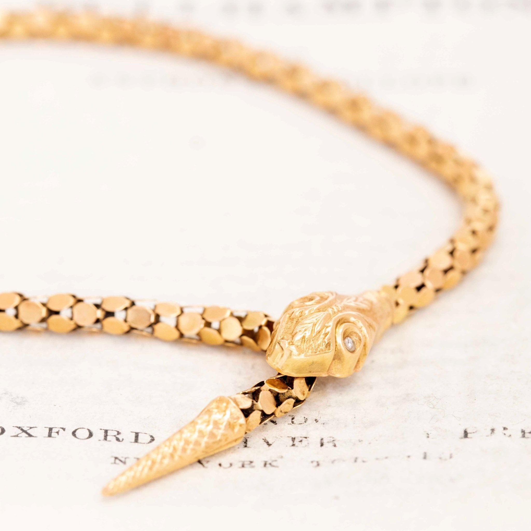 Antique gold serpent necklace with seed pearl eyes