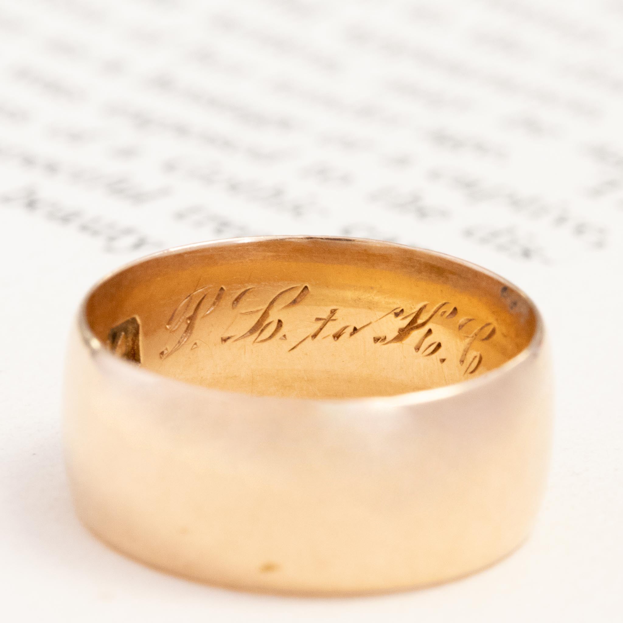 antique wide gold band with engraving inside