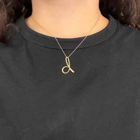 D Letter Pendant, by Elsa Peretti for Tiffany & Co.