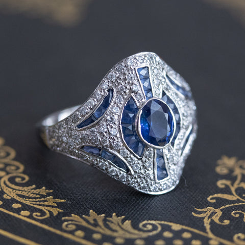 2.25ctw Art Deco style oval sapphire, calibre sapphire and diamond cocktail ring in 18kt white gold – alternate view 5