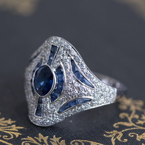 2.25ctw Art Deco style oval sapphire, calibre sapphire and diamond cocktail ring in 18kt white gold – alternate view 4