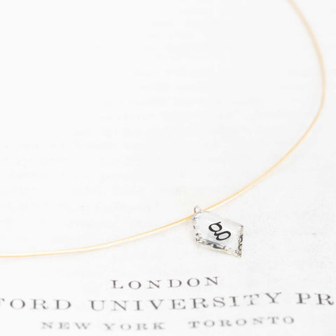 Inked Diamonds letter G laser engraved kite portrait cut diamond pendant on vintage gold collar – alternate view 3