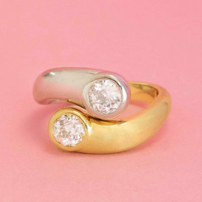 Toi et Moi ring with two old European cut diamonds in platinum and yellow gold bypass setting