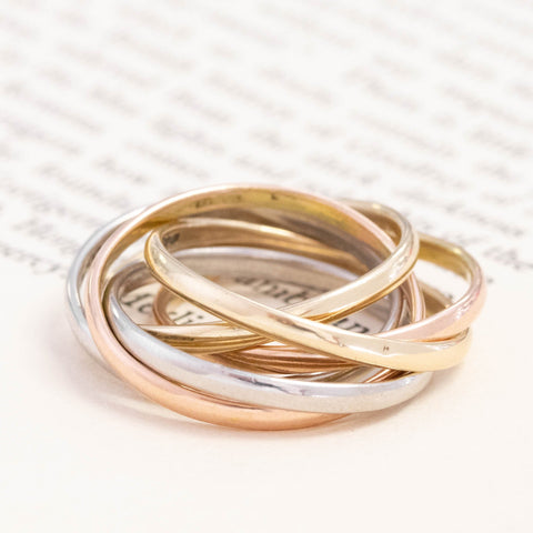 Triple tone six band rolling ring in 9kt yellow, white and rose gold – alternate view 3