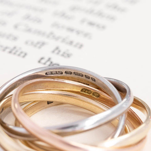 Triple tone six band rolling ring in 9kt yellow, white and rose gold – alternate view 4