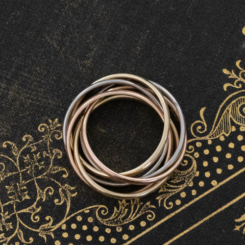 Triple tone six band rolling ring in 9kt yellow, white and rose gold – alternate view 5